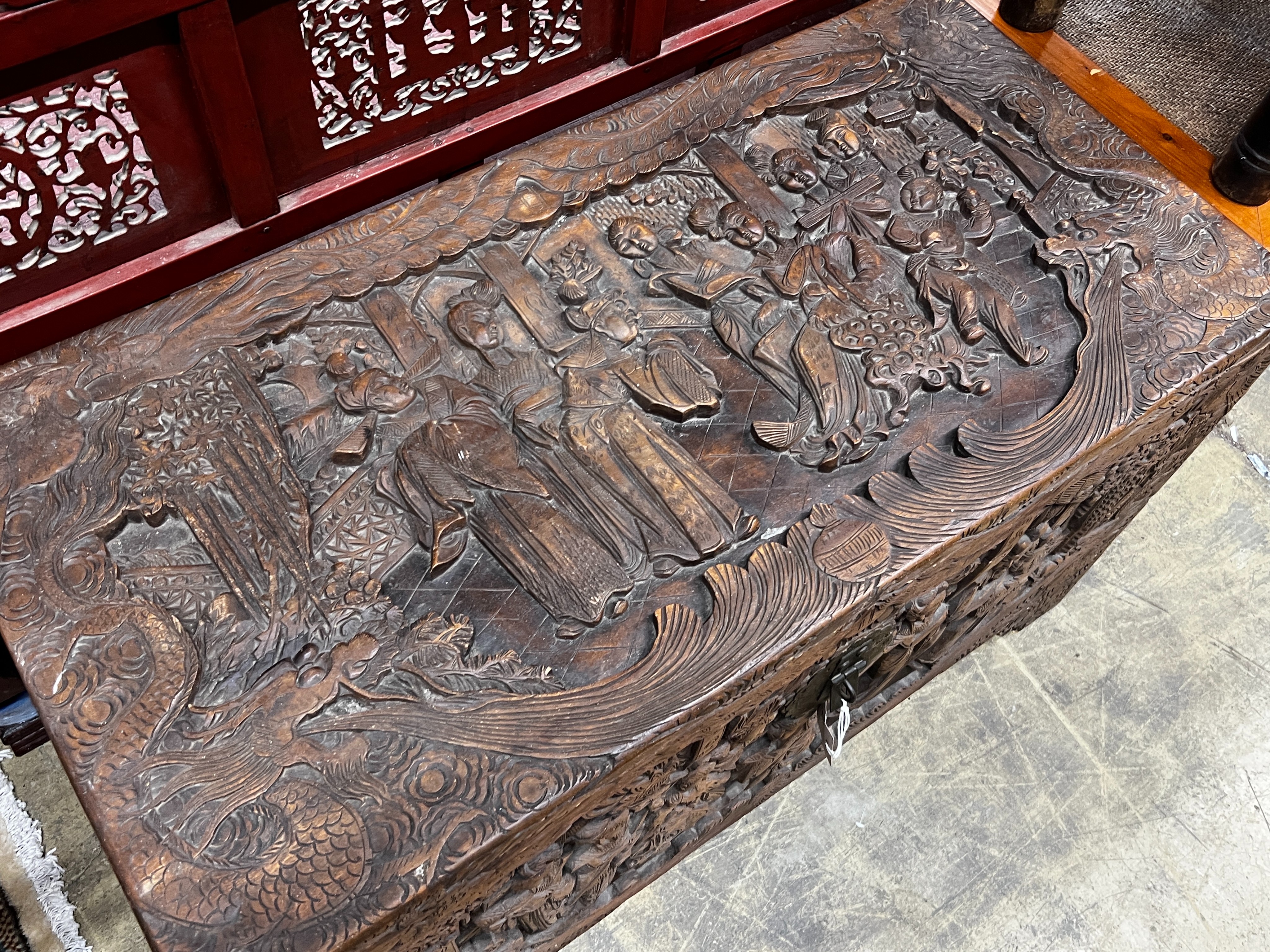 A Chinese carved camphorwood trunk, length 104cm, depth 52cm, height 61cm